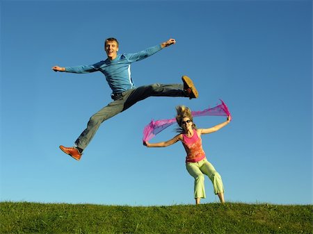 paha_l (artist) - couples jump on grass Stockbilder - Microstock & Abonnement, Bildnummer: 400-04431514