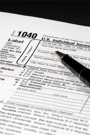 simsearch:400-05339747,k - Detail view of an Income Tax form about to be completed Stockbilder - Microstock & Abonnement, Bildnummer: 400-04431671