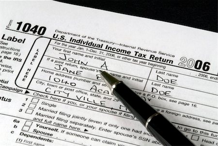 simsearch:400-05339747,k - Detail view of an Income Tax form about to be completed Stock Photo - Budget Royalty-Free & Subscription, Code: 400-04431673