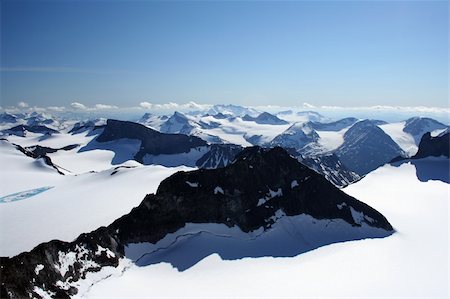 This is an image taken on the top of "Galdhøpiggen" 2469 meters above sealevel. This is the highest mountain in Northern Europe. The Glacier in the front is called "Svellnosbreen". Stock Photo - Budget Royalty-Free & Subscription, Code: 400-04431701