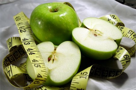 physical fit food - apples fruits & measuring tape Stock Photo - Budget Royalty-Free & Subscription, Code: 400-04432198