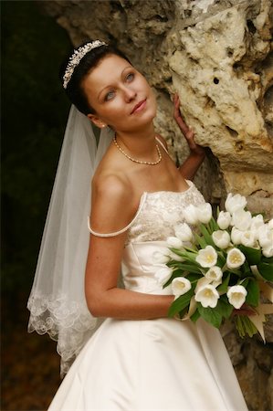 Beautiful the bride with a bouquet from tulips Stock Photo - Budget Royalty-Free & Subscription, Code: 400-04432271
