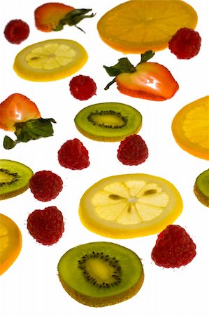 simsearch:400-04763797,k - Fresh strawberries, kiwis, oranges, lemons and raspberries  - delicious and nutritious snack. Foto de stock - Royalty-Free Super Valor e Assinatura, Número: 400-04432369