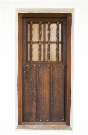 An old and decorative wooden door from an historical building in California Stock Photo - Budget Royalty-Free & Subscription, Code: 400-04432375