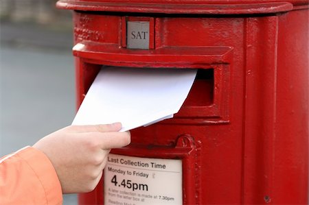 england post box - posting letter to red british postbox on street Stock Photo - Budget Royalty-Free & Subscription, Code: 400-04432747