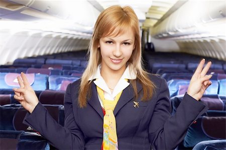 simsearch:400-04429524,k - blond air hostess (stewardess) in the empty airliner cabin Stock Photo - Budget Royalty-Free & Subscription, Code: 400-04432808
