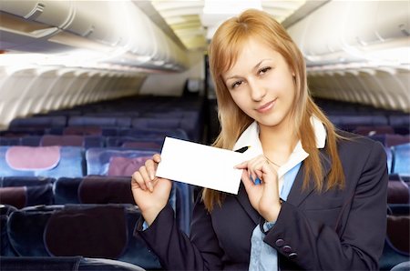 simsearch:625-00805855,k - blond air hostess (stewardess) in the empty airliner cabin Stock Photo - Budget Royalty-Free & Subscription, Code: 400-04433027