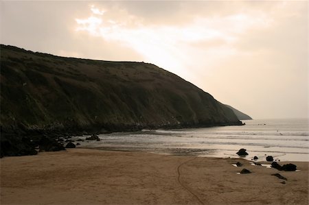 simsearch:400-05089504,k - The rocky coastline in Croyde, Devon. Fotografie stock - Microstock e Abbonamento, Codice: 400-04433192