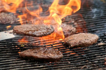 Flamed Broiled Burgers Stock Photo - Budget Royalty-Free & Subscription, Code: 400-04433244