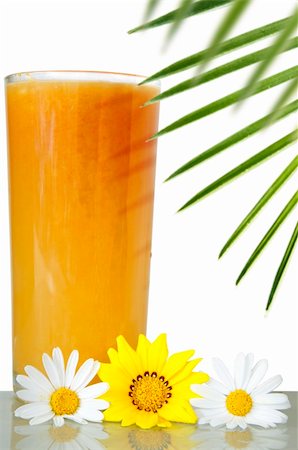 simsearch:400-04585282,k - Tropical drink with flowers and green foreground foliage Stock Photo - Budget Royalty-Free & Subscription, Code: 400-04433373