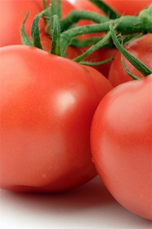 simsearch:400-05075296,k - Vine Tomato's set against a plain background Stock Photo - Budget Royalty-Free & Subscription, Code: 400-04433457
