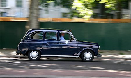 London Taxi car with motion blur effect Stock Photo - Budget Royalty-Free & Subscription, Code: 400-04433483