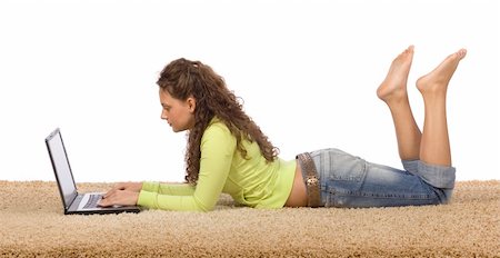isolated on white female teenager lying on the carpet with laptop Stock Photo - Budget Royalty-Free & Subscription, Code: 400-04433617