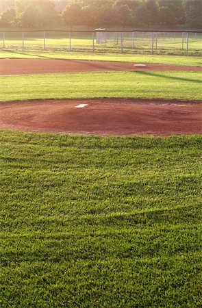 simsearch:400-05683460,k - A baseball field cast in early morning light. Photographie de stock - Aubaine LD & Abonnement, Code: 400-04433668