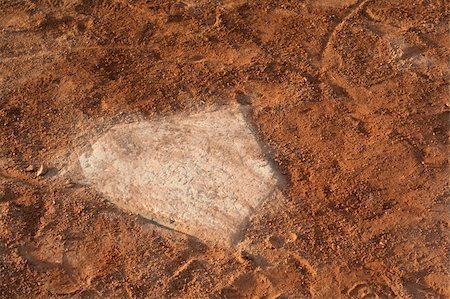 simsearch:400-05683460,k - A closeup of a battered home plate at a baseball diamond. Photographie de stock - Aubaine LD & Abonnement, Code: 400-04433670