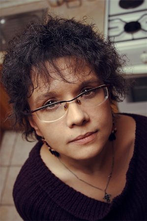 demidov (artist) - woman in glasses look upward in camera Stock Photo - Budget Royalty-Free & Subscription, Code: 400-04433716