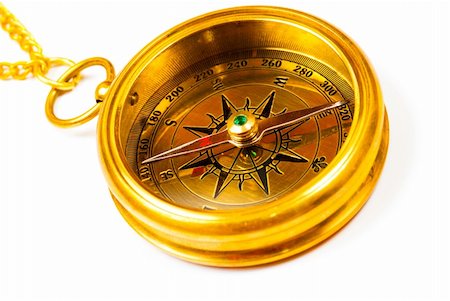 simsearch:400-07714543,k - Old style brass compass on white background Fotografie stock - Microstock e Abbonamento, Codice: 400-04433723