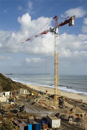 High Rise crane at a construction site with sea view Stock Photo - Budget Royalty-Free & Subscription, Code: 400-04433734