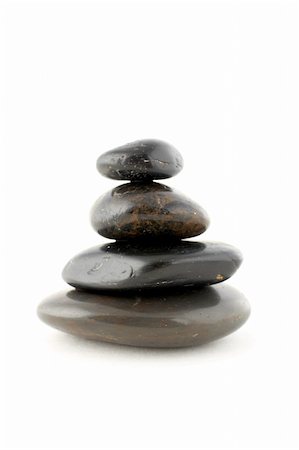 simsearch:400-04946108,k - Stack of balanced stones with shadow on white background Photographie de stock - Aubaine LD & Abonnement, Code: 400-04433779