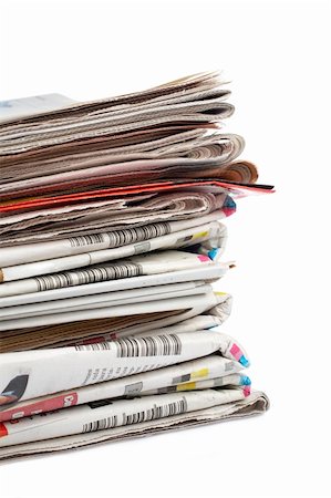 simsearch:400-07774296,k - A stack of local newspapers with focus on front. Shallow DOF Stockbilder - Microstock & Abonnement, Bildnummer: 400-04444032