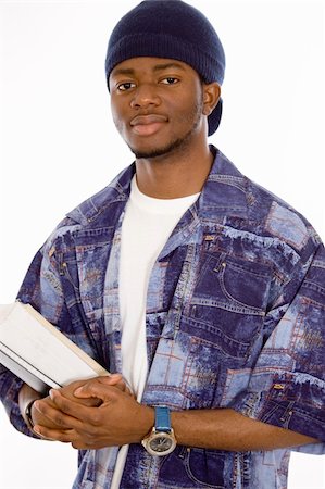 This is an image of a student holding some books. This image can be used to represent student themes. Fotografie stock - Microstock e Abbonamento, Codice: 400-04444505