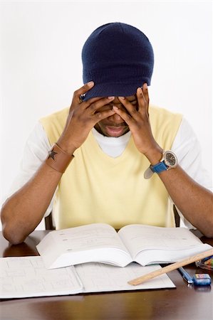 This is an image of a student suffering from academic pressure. This image can be used to represent academic and student themes. Fotografie stock - Microstock e Abbonamento, Codice: 400-04444507