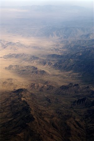 Aerial image of earth toned mountainous landscape Stock Photo - Budget Royalty-Free & Subscription, Code: 400-04444524