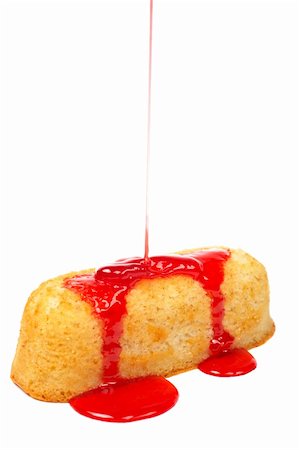 simsearch:400-08332621,k - Strawberry syrup being poured over a cake on white background. Shallow DOF Stock Photo - Budget Royalty-Free & Subscription, Code: 400-04444589
