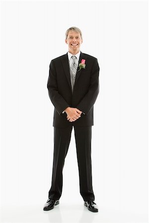 Portrait of Caucasian male in tuxedo with boutonniere. Stock Photo - Budget Royalty-Free & Subscription, Code: 400-04445209