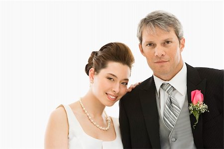 simsearch:400-04950359,k - Portrait of Caucasian groom and Asian bride. Stock Photo - Budget Royalty-Free & Subscription, Code: 400-04445224