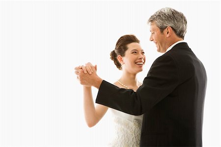 simsearch:400-04950359,k - Portrait of Caucasian groom and Asian bride dancing. Stock Photo - Budget Royalty-Free & Subscription, Code: 400-04445222