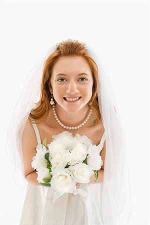 simsearch:400-04950359,k - Portrait of Caucasian bride holding bouquet. Stock Photo - Budget Royalty-Free & Subscription, Code: 400-04445244