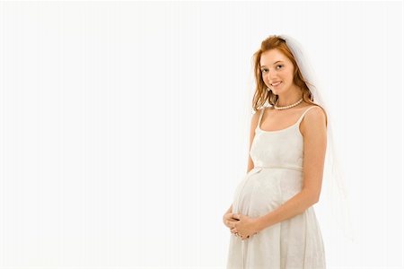simsearch:400-04950359,k - Pregnant Caucasian bride with hands on her belly. Stock Photo - Budget Royalty-Free & Subscription, Code: 400-04445619