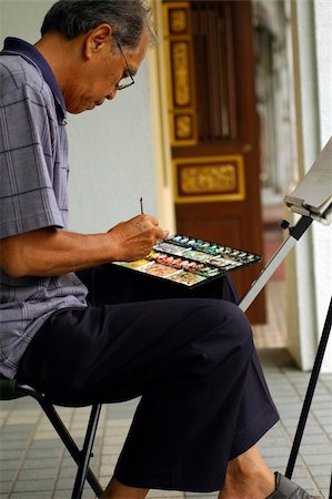 An asian chinese artist painting on street Stock Photo - Budget Royalty-Free & Subscription, Code: 400-04446266