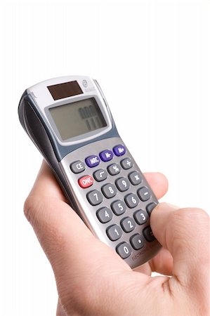 hand with calculator, number 777 on it display Foto de stock - Super Valor sin royalties y Suscripción, Código: 400-04446954