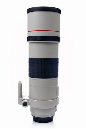 Camera telephoto lens reflected on the white background Foto de stock - Super Valor sin royalties y Suscripción, Código: 400-04447274