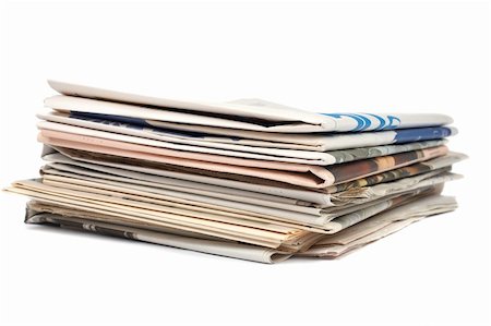 simsearch:400-06568755,k - A stack of local newspapers with focus on front. Shallow DOF Stock Photo - Budget Royalty-Free & Subscription, Code: 400-04447275