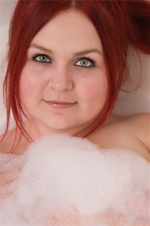 Close up of a red hair model in bubble bath Stock Photo - Budget Royalty-Free & Subscription, Code: 400-04447593