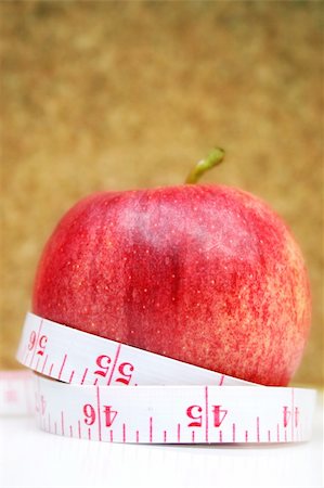 simsearch:400-05907063,k - Measurement tape wrapped around red apple - health, diet Stock Photo - Budget Royalty-Free & Subscription, Code: 400-04448110