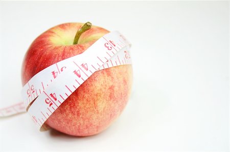 simsearch:400-03990146,k - Measurement tape wrapped around red apple - health, diet Foto de stock - Royalty-Free Super Valor e Assinatura, Número: 400-04448111