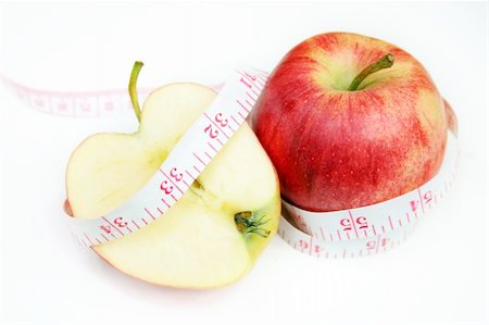 simsearch:400-04271582,k - Measurement tape wrapped around red apple - health, diet Photographie de stock - Aubaine LD & Abonnement, Code: 400-04448113