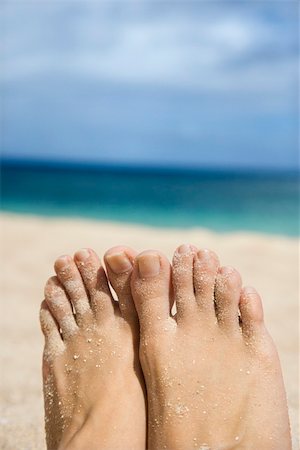 simsearch:400-04912125,k - Caucasian young adult woman sandy feet on beach. Stock Photo - Budget Royalty-Free & Subscription, Code: 400-04448272