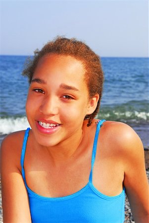 preteen beautiful face - Portrait of a young beautiful girl on sea shore Stock Photo - Budget Royalty-Free & Subscription, Code: 400-04448758