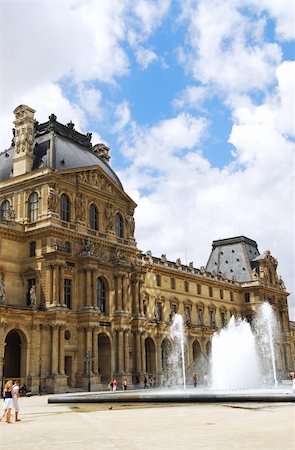 simsearch:400-04455773,k - Louvre museum illuminated by sun reflections. Paris, France. Foto de stock - Royalty-Free Super Valor e Assinatura, Número: 400-04448774
