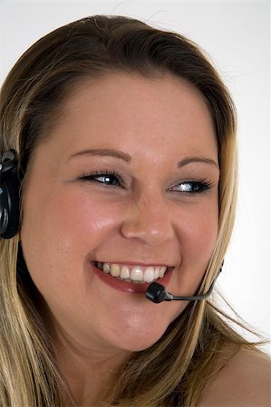 simsearch:400-03914864,k - Smiling telesales girl Stock Photo - Budget Royalty-Free & Subscription, Code: 400-04448816