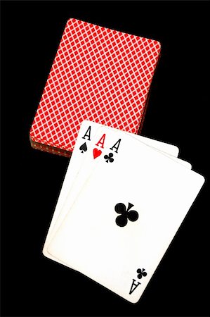 simsearch:400-06389082,k - Three aces laid pn a deck of cards Stockbilder - Microstock & Abonnement, Bildnummer: 400-04449314