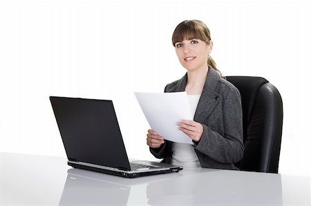 Beautiful business woman working with a laptop on a white background Stock Photo - Budget Royalty-Free & Subscription, Code: 400-04449522