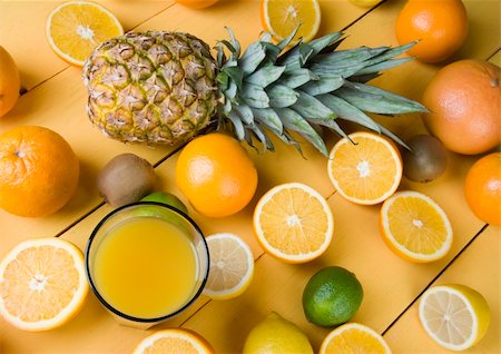 squeezing lemon juice - Watch fruits. Eat fruits. Buy fruits! Stock Photo - Budget Royalty-Free & Subscription, Code: 400-04440176