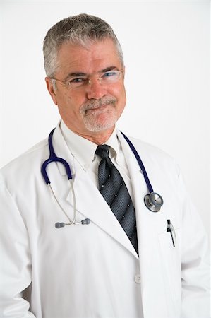 pblscooter (artist) - Happy doctor wearing a while lab coat and stethoscope around his neck with hands in pockets Stock Photo - Budget Royalty-Free & Subscription, Code: 400-04440348