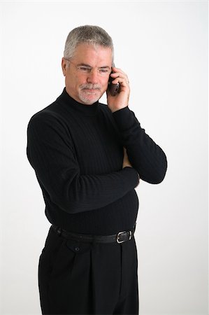 pblscooter (artist) - Executive listening to a conversation on his cell phone Stock Photo - Budget Royalty-Free & Subscription, Code: 400-04440383